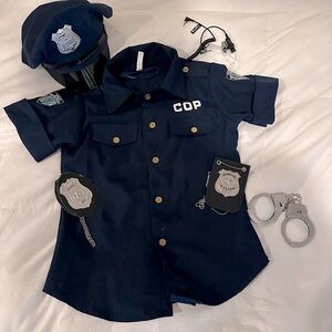 Cop Halloween costume with accessories.